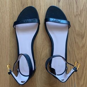 Stuart Weitzman Nudist flat leather sandal, black